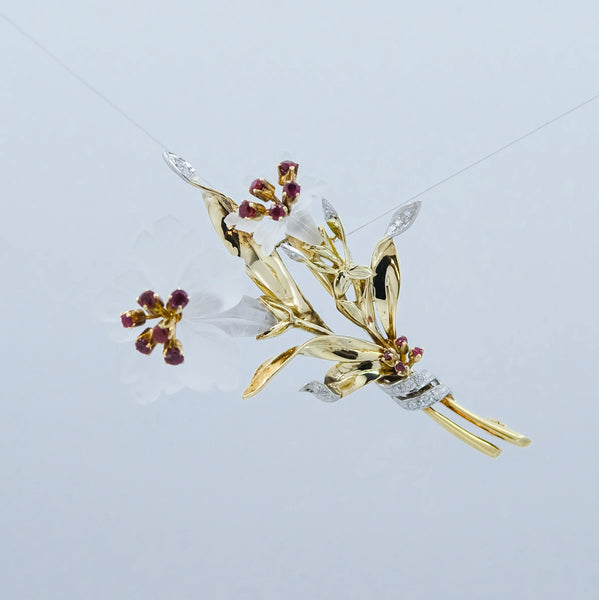 A Flower platinum and 14 yellow gold brooch