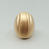 A BUNDA Boutique ring in bronze with a luxurious brushed satin finish. The ring's interior has a high polish. Looks great worn on the ring or middle finger.