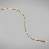 A BUNDA diamond 'Tennis' bracelet in 18ct yellow gold. The bracelet is set with round brilliant diamonds in crown settings.  Characteristics of Round Brilliant Cut Diamonds: 72 = 1.08ct, F colour, VS Clarity  Total weight: 5.89 grams