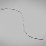A BUNDA 'Tennis' bracelet in 18ct white gold. The bracelet is set with round brilliant diamonds in castle claw settings. Bracelet is stamped 'BUNDA'.  Characteristics of Round Brilliant Cut Diamonds: 87 = .69ct, F colour, VS Clarity  Total weight of bracelet: 5.19 grams