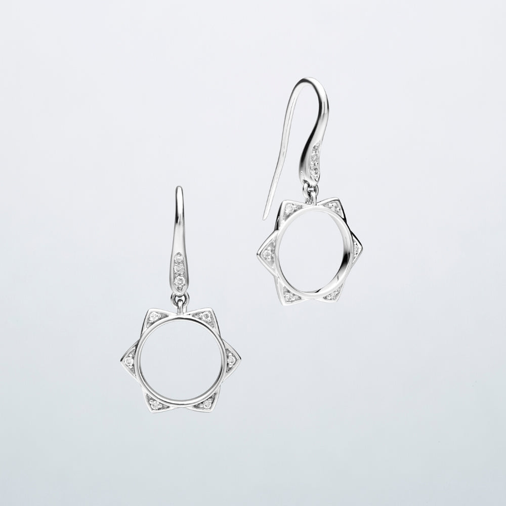 'BUNDA Star' Diamond Earrings in 18ct white gold. A pair of BUNDA Star diamond earrings in 18 carat white gold, featuring bead set, round brilliant cut diamonds on each point of the star, fitted with a thread-set diamond hook.