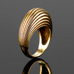 The 'Bundova' ribbed dress ring in 9ct yellow gold is a fantastic piece that adds sophistication on all occasions. The perfect right hand ring. Wear with our 'Bundova' 9ct gold earrings to add impact.  Size 'L' currently available. Can make to order. Appox weight 6.90 grams
