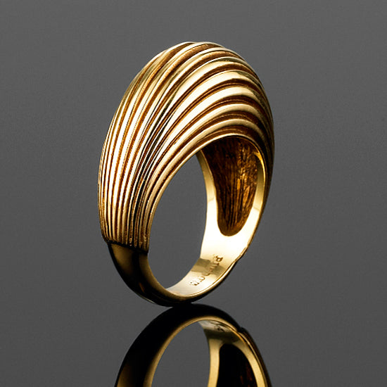 The 'Bundova' ribbed dress ring in 9ct yellow gold is a fantastic piece that adds sophistication on all occasions. The perfect right hand ring. Wear with our 'Bundova' 9ct gold earrings to add impact.  Size 'L' currently available. Can make to order. Appox weight 6.90 grams