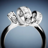 A BUNDA 'Lyra' diamond ring made in 18 carat white gold, set with round brilliant cut diamonds.  Characteristics of diamonds: 25 = 0.69ct, F colour, VS clarity.  Total Weight: 6.65g